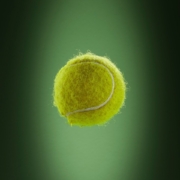 a tennis ball is flying through the air